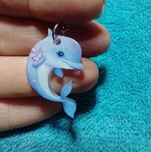 Cute purple dolphin wire dangle earrings